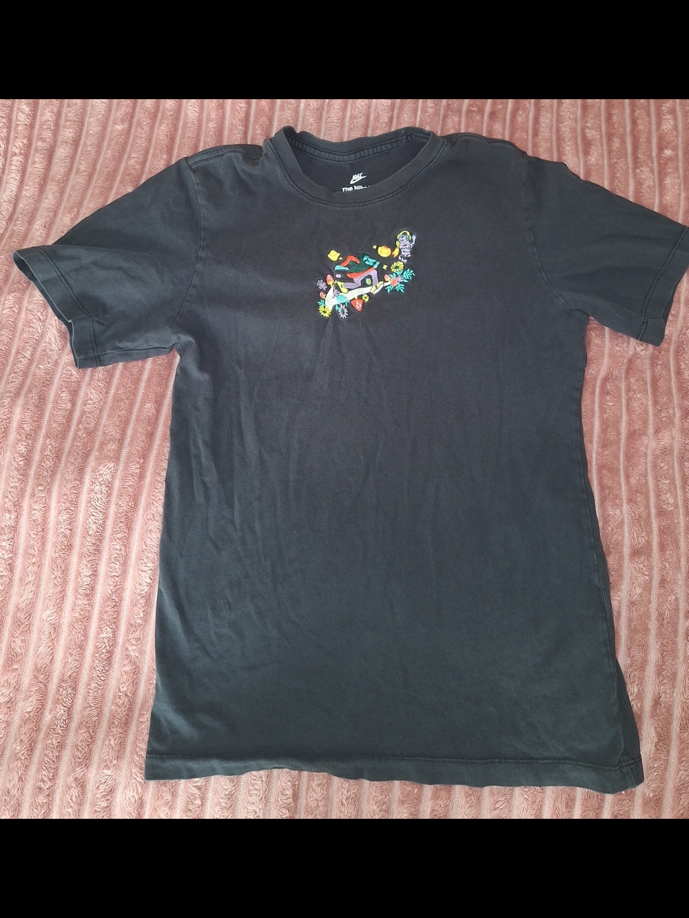 Nike Black Tee with Small Multicolor Chest Graphic